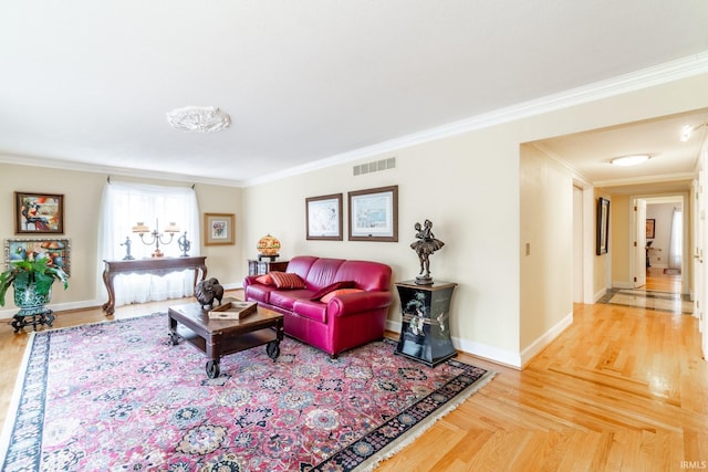 living room featuring ornamental molding and wood-type flooring