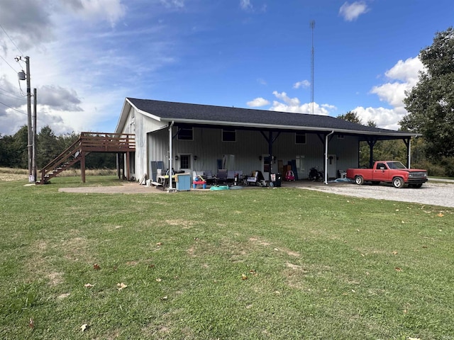 878 N Base Rd, Rockport, IN 47635 - rear view of house with a yard, stairway, and a wooden deck