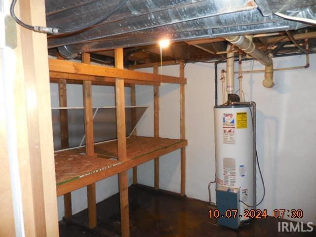 basement featuring gas water heater