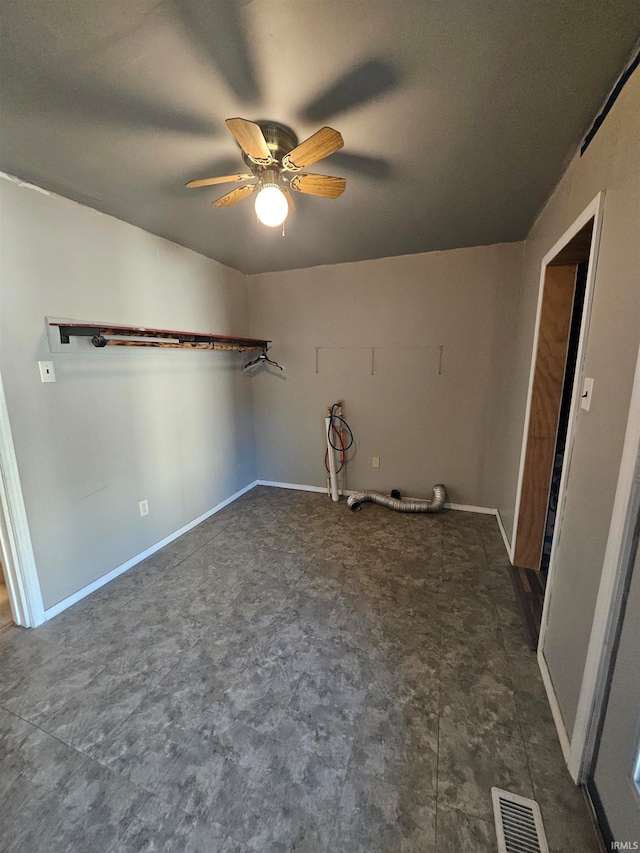 interior space featuring ceiling fan