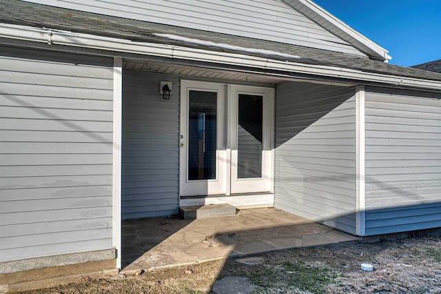 doorway to property with a patio