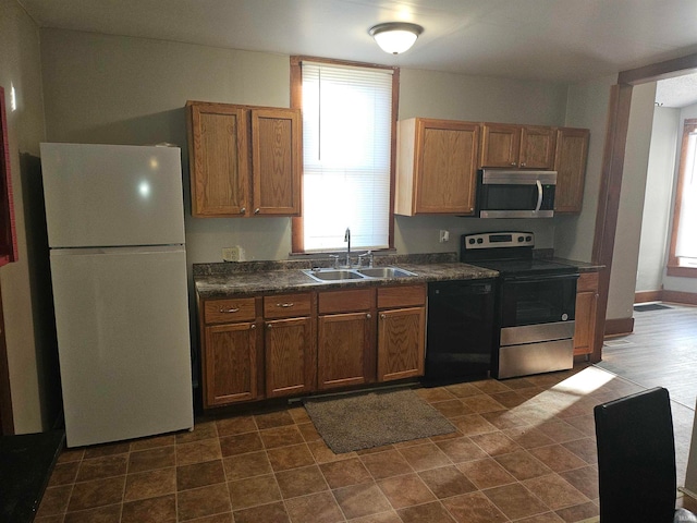 kitchen featuring appliances with stainless steel finishes and sink