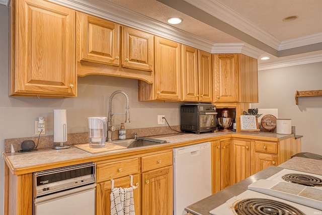 kitchen with white dishwasher, ornamental molding, and sink