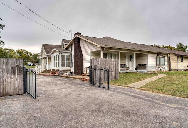 view of front of home featuring covered porch