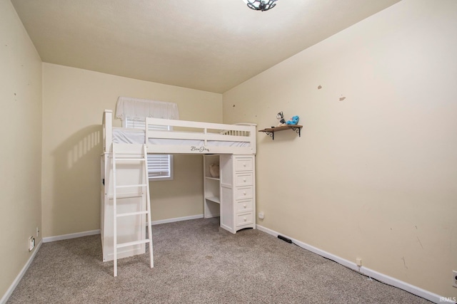 unfurnished bedroom with carpet