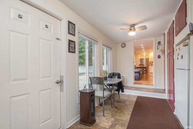 office area with ceiling fan