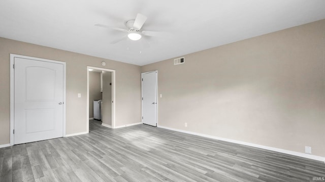 unfurnished bedroom featuring light hardwood / wood-style flooring and ceiling fan