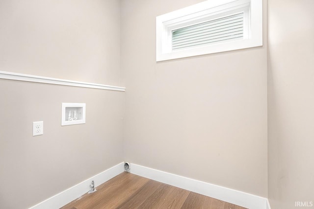 1916 Newbury Cir, Goshen, IN 46526 - laundry area with washer hookup, wood finished floors, and gas dryer hookup