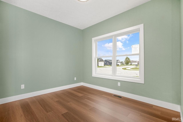 1916 Newbury Cir, Goshen, IN 46526 - spare room with dark wood finished floors and baseboards