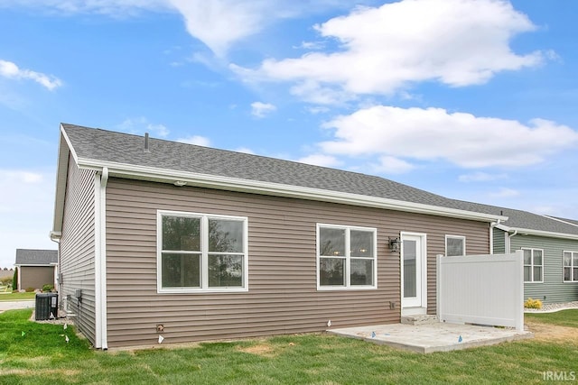 1916 Newbury Cir, Goshen, IN 46526 - rear view of property with a yard, a patio, and roof with shingles