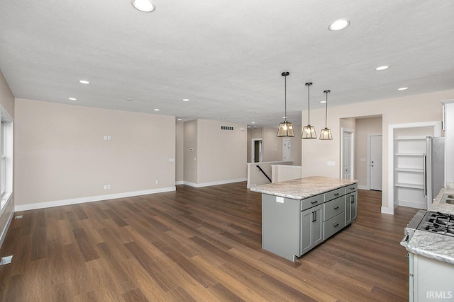 1916 Newbury Cir, Goshen, IN 46526 - kitchen featuring gray cabinetry, stainless steel appliances, a center island, recessed lighting, and dark wood-type flooring