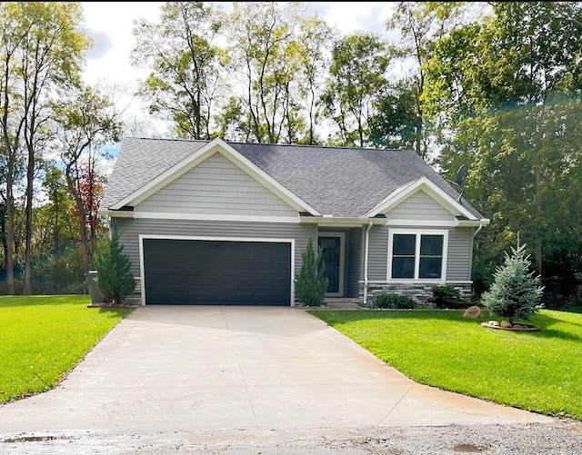 view of front facade with a front lawn and a garage