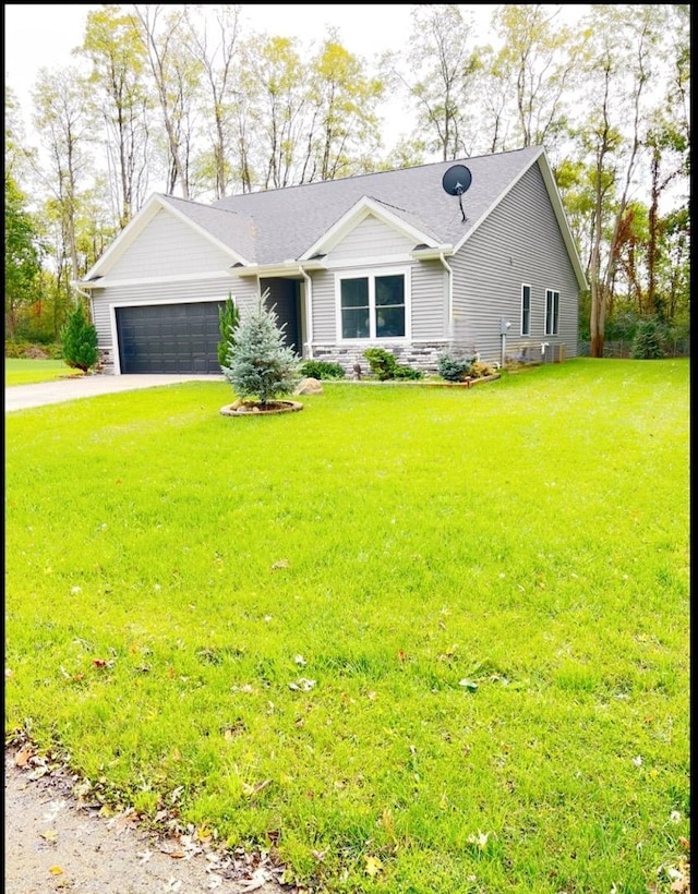 ranch-style house with a front lawn and a garage