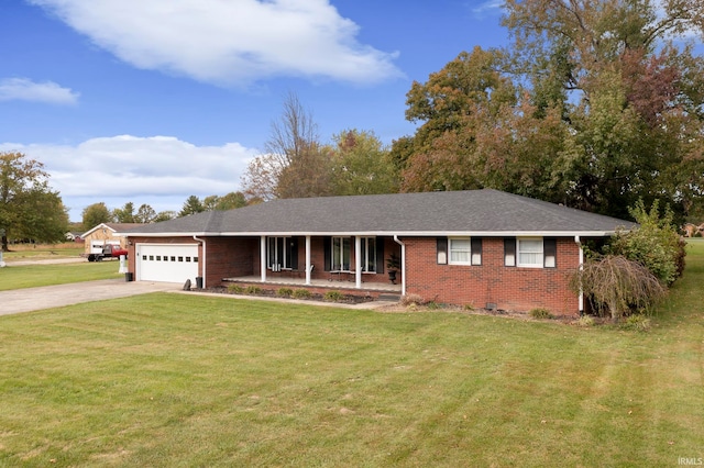 single story home featuring a front lawn and a garage