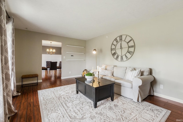 2324 W 56th Hwy, Scottsburg, IN 47170 - living area featuring wood-type flooring, baseboards, and a chandelier