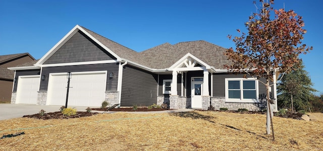 craftsman-style home featuring a garage