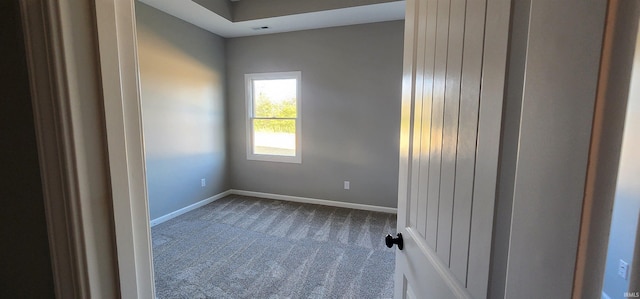 spare room featuring carpet flooring