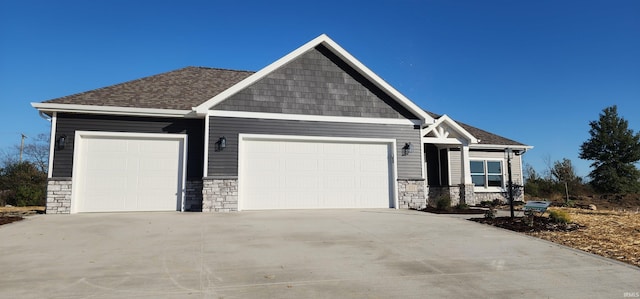 craftsman-style home featuring a garage