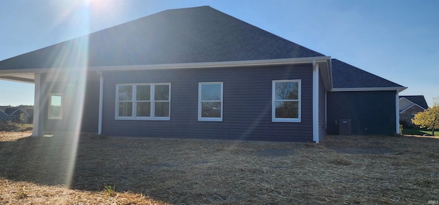 view of side of property with central AC unit