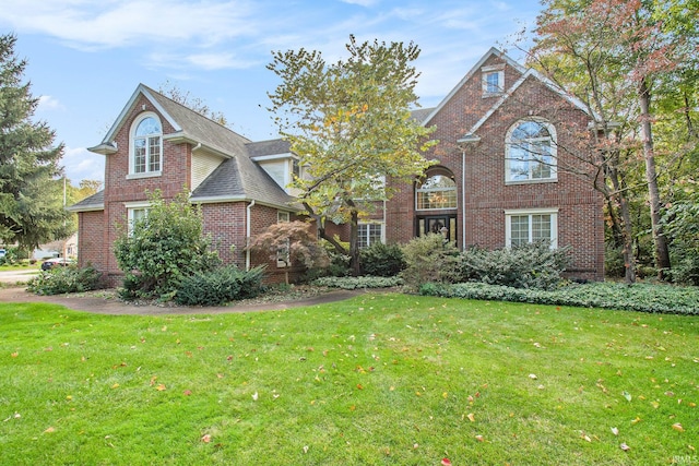 front facade with a front lawn