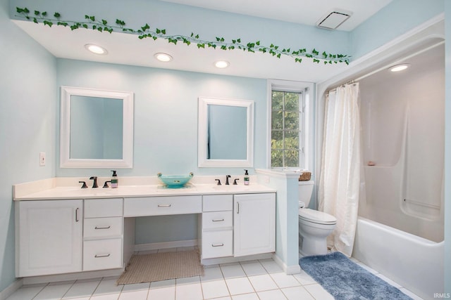 full bathroom featuring vanity, toilet, shower / tub combo, and tile patterned flooring