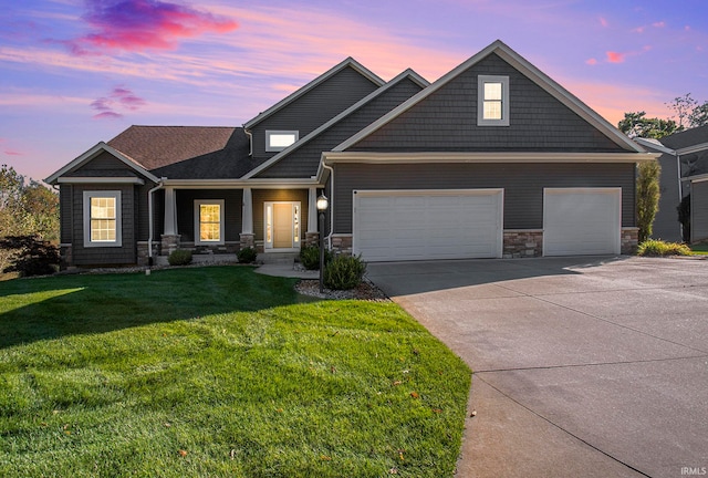 craftsman-style home with a yard