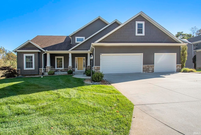 craftsman-style house with covered porch and a front yard