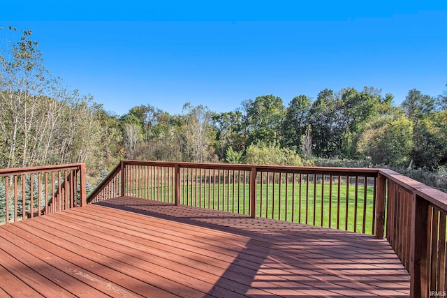 deck featuring a yard