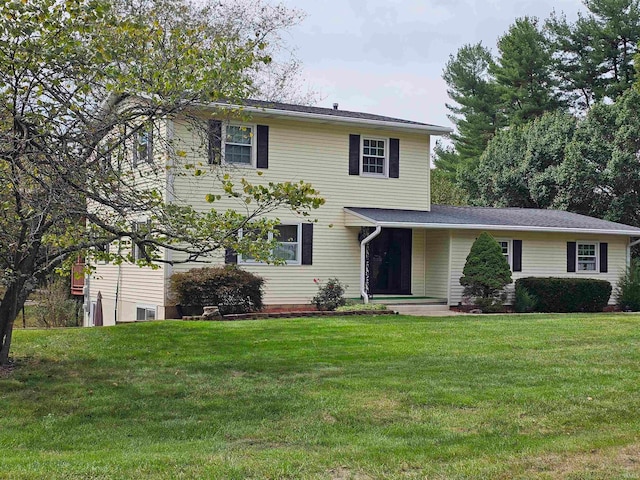 view of front of property with a front lawn