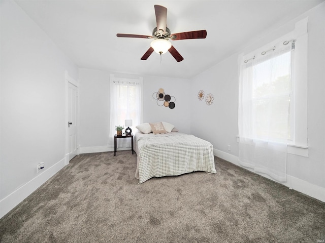 unfurnished bedroom featuring carpet floors and ceiling fan