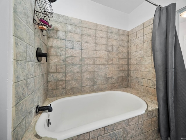 bathroom featuring shower / tub combo