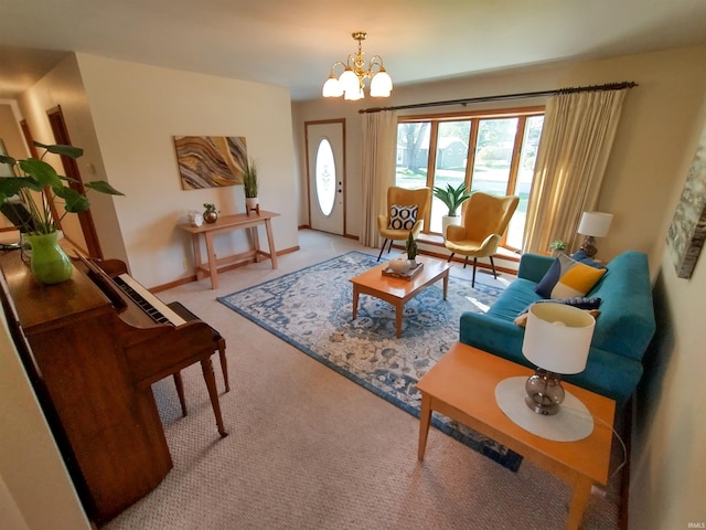 living room featuring carpet floors and a chandelier