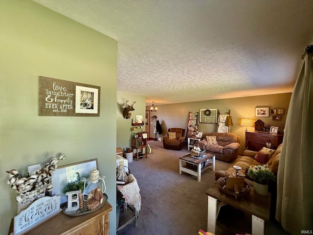 living room with a textured ceiling and carpet floors