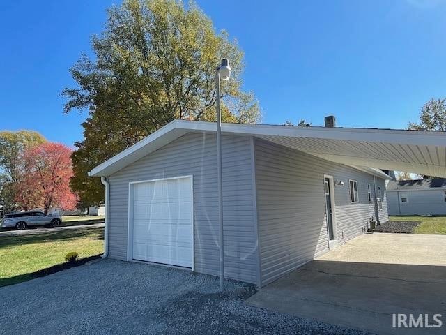 garage with a carport