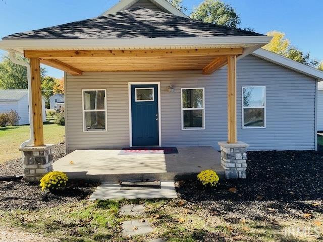 view of front of home with a patio