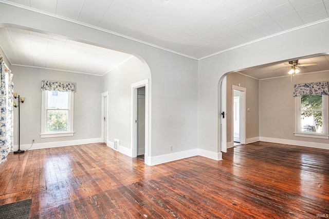 spare room with ceiling fan, wood-type flooring, and ornamental molding