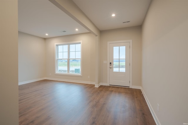 entryway with hardwood / wood-style flooring