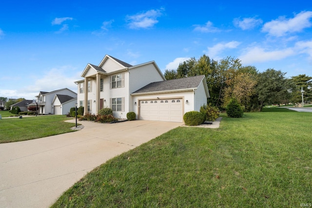 view of front of home with a front lawn and a garage