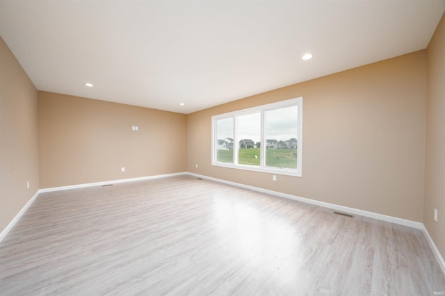 empty room featuring light hardwood / wood-style flooring