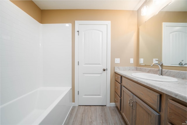 bathroom featuring vanity and hardwood / wood-style floors