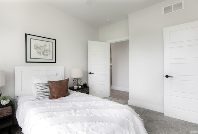 carpeted bedroom with ceiling fan