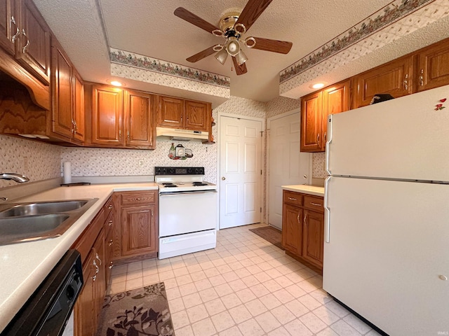 kitchen with white appliances, ceiling fan, a textured ceiling, and sink