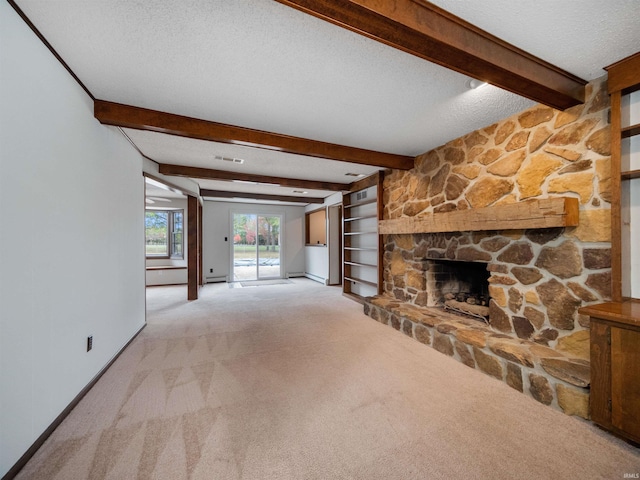 unfurnished living room with light carpet, beam ceiling, a textured ceiling, a fireplace, and baseboard heating