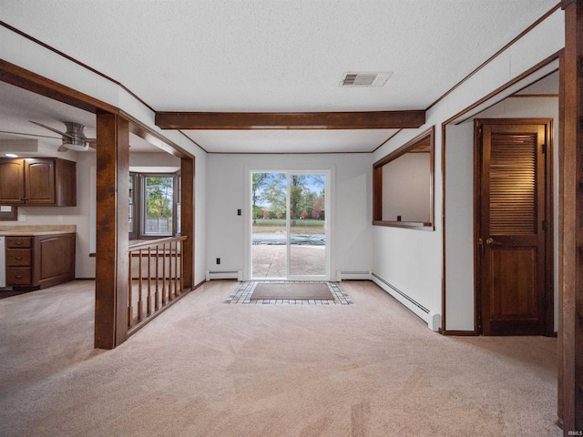 entryway featuring light carpet, a textured ceiling, beamed ceiling, and baseboard heating