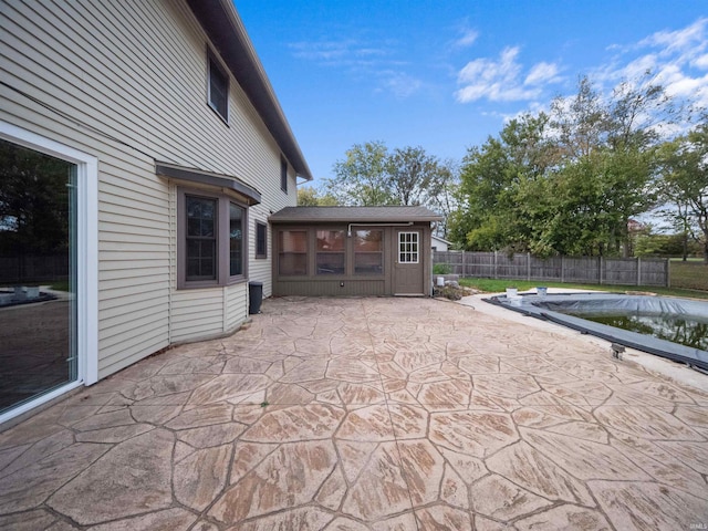 view of patio with a covered pool