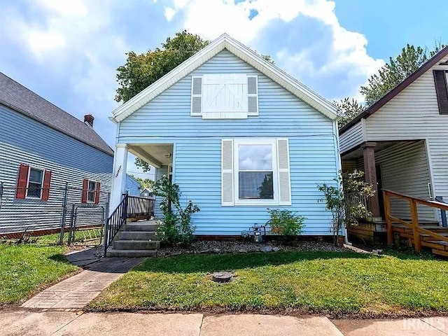 bungalow with a front lawn