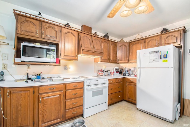 kitchen featuring white appliances