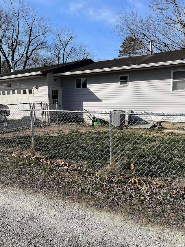 view of side of home featuring cooling unit