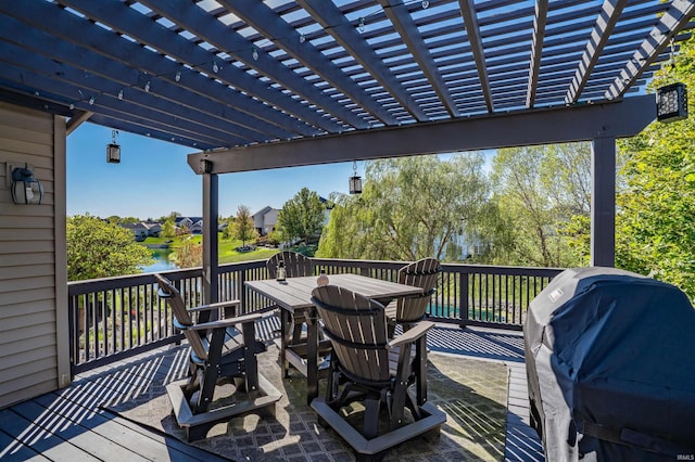 wooden terrace featuring area for grilling, a pergola, and a water view