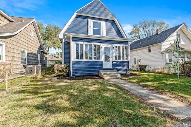 view of front facade featuring a front yard